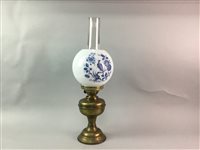 Lot 195 - A BRASS OIL LAMP