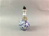 Lot 221 - A HUTSCHENREUTHER BLUE AND WHITE LAMP