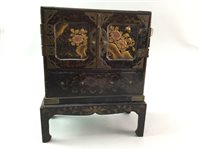 Lot 262 - A JAPANESE TABLE CABINET