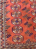 Lot 609 - BOKHARA BORDERED RUG decorated with two rows...