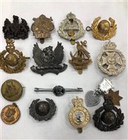 Lot 351 - A LOT OF BADGES AND A LOCKET