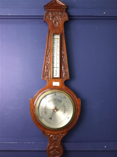 Lot 29 - AN EDWARDIAN WHEEL BAROMETER AND THERMOMETER