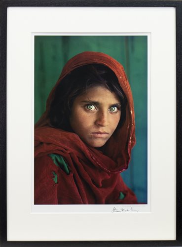 Lot 684 - SHARBAT GULA, AFGHAN GIRL, PAKISTAN, AN OFFSET LITHOGRAPHIC PRINT BY STEVE MCCURRY