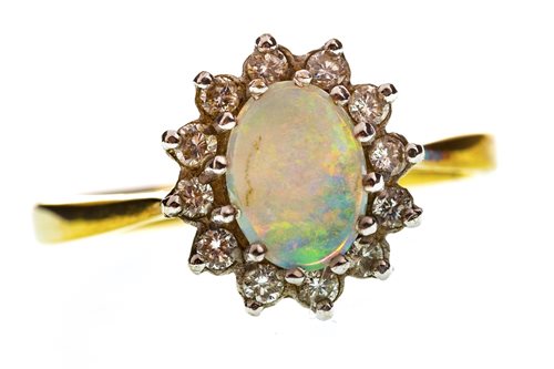 Lot 45 - AN OPAL AND DIAMOND RING