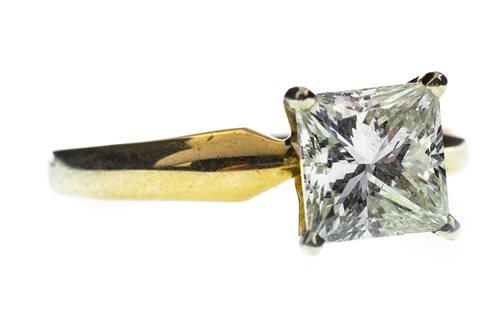 Lot 2 - A PRINCESS CUT DIAMOND SOLITAIRE RING