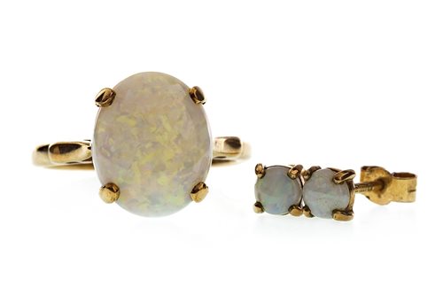Lot 58 - AN OPAL RING AND EARRING SET
