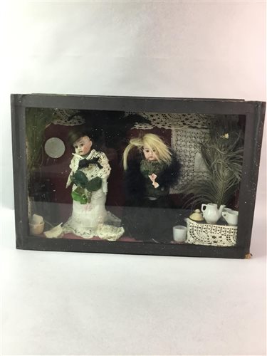 Lot 123 - A CASED DISPLAY OF VICTORIAN MEMORIAL DOLLS
