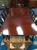 Lot 136 - A MAHOGANY DINING TABLE AND EIGHT CHAIRS