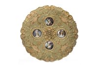 Lot 1743 - A PAINTED AND GILDED CIRCULAR WOODEN WALL PLAQUE
