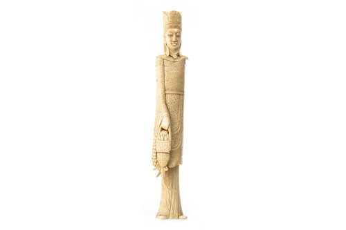 Lot 989 - A CHINESE IVORY FIGURE OF A FEMALE