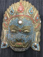 Lot 975 - A TIBETAN JEWELLED WALL MASK AND A PLAQUE