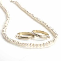 Lot 31 - PAIR OF NINE CARAT GOLD OVAL HOOP EARRINGS...