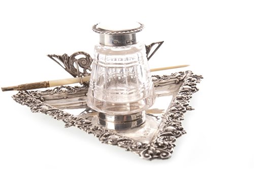Lot 882 - A VICTORIAN SILVER LIDDED GLASS INKWELL WITH A MOTHER OF PEARL PEN HOLDER