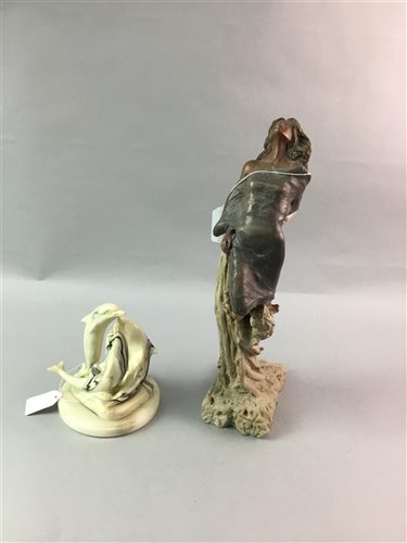 Lot 241 - A CONTEMPORARY SCULPTURE OF A WOMAN ON A TREE AND A GROUP OF DOLPHINS