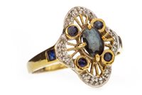 Lot 137 - A BLUE GEM AND DIAMOND RING