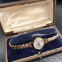 Lot 253 - A LOT OF THREE WATCHES, A WATCH STRAP AND MEDALS