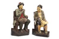 Lot 1769 - A PAIR OF VICTORIAN POLYCHROME PAINTED CAST IRON DOOR STOPS