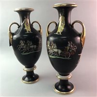 Lot 76 - A PAIR OF TWIN HANDLED VASES