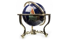 Lot 1771 - A TERRESTRIAL GLOBE ON BRASS TABLE STAND