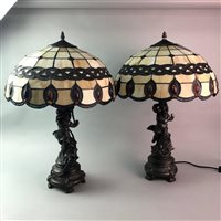 Lot 63 - A PAIR OF FIGURAL TABLE LAMPS WITH LEADED GLASS SHADES