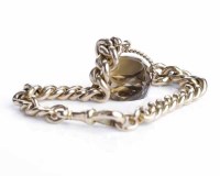 Lot 82 - NINE CARAT GOLD CURB LINK BRACELET WITH FOB...