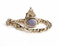 Lot 83 - NINE CARAT GOLD CURB LINK BRACELET WITH FOB...