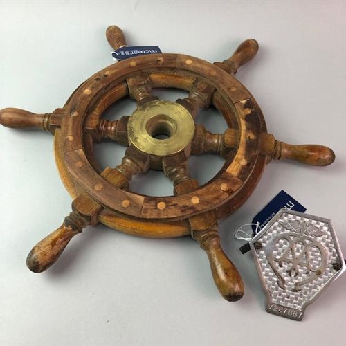 Lot 17 - A SMALL SHIPS WHEEL AND A CHROME-PLATED AA VEHICLE BADGE