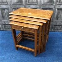 Lot 199 - A MODERN NEST OF FOUR TABLES