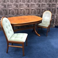 Lot 197 - A MODERN DINING SUITE