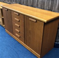 Lot 197 - A MODERN DINING SUITE