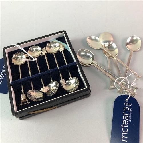 Lot 15 - A SET OF SIX SILVER SEAL TOP COFFEE SPOONS AND ANOTHER SET OF SPOONS