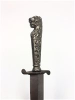 Lot 1783 - A COMMANDO STYLE DAGGER WITH LATER LION CAST HANDLE