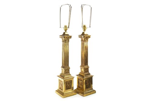 Lot 804 - A PAIR OF BRASS CORINTHIAN PILLAR TABLE LAMPS AND ANOTHER