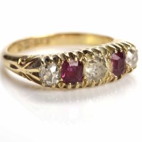 Lot 111 - RUBY AND DIAMOND FIVE STONE RING set with...