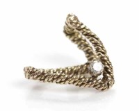 Lot 119 - DIAMOND SCARF CLIP set with a brilliant cut...