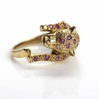 Lot 120 - RUBY AND DIAMOND SET PANTHER RING with round...