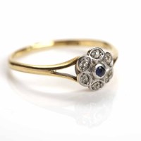 Lot 121 - SAPPHIRE AND DIAMOND CLUSTER RING of floral...