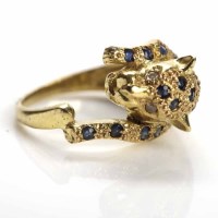 Lot 122 - SAPPHIRE AND DIAMOND SET PANTHER RING with...