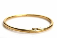Lot 128 - CHINESE TWENTY TWO CARAT GOLD BANGLE with...