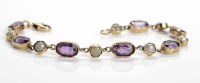 Lot 132 - AMETHYST SET BRACELET set with alternating...