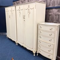 Lot 318 - A FRENCH STYLE CREAM PAINTED BEDROOM SUITE