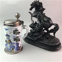 Lot 337 - A GERMAN TINGLAZE AND PEWTER LIDDED TANKARD AND A SPELTER HORSE GROUP