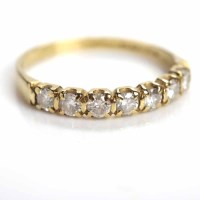 Lot 146 - DIAMOND HALF ETERNITY RING set with brilliant...