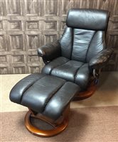 Lot 59 - A LEATHER RECLINER ARMCHAIR AND FOOTSTOOL