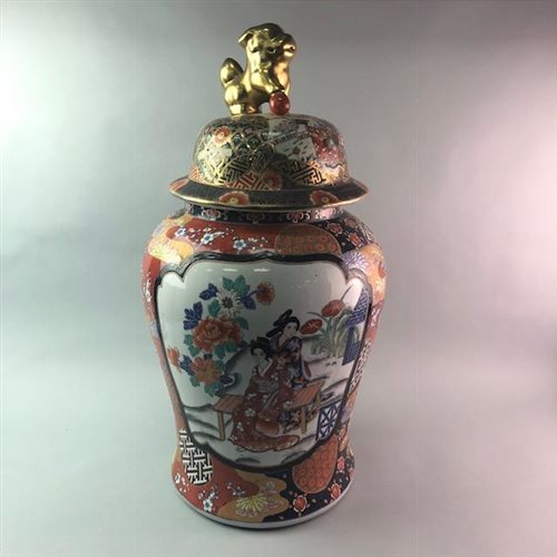 Lot 63 - A PAIR OF CHINESE VASES WITH COVERS
