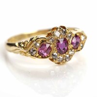 Lot 156 - VICTORIAN RUBY AND DIAMOND RING set with three...
