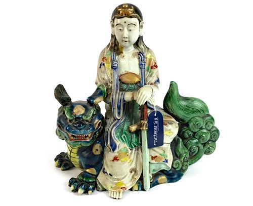Lot 1012 - A CHINESE GROUP OF GUANYIN AND A LION
