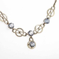 Lot 159 - TOPAZ SET NECKLET set with four round blue...