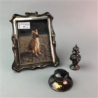 Lot 15 - A SILVER PHOTOGRAPH FRAME, SHAKER AND CAPSTAN INKWELL