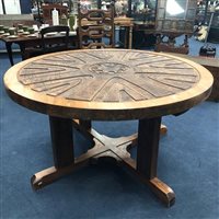 Lot 99 - A CARVED WOOD CIRCULAR DINING TABLE